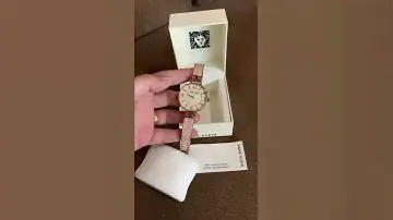 Anne Klein  AK/2210BMRG Rose Gold-Tone and Pink Marbleized Bangle Watch
